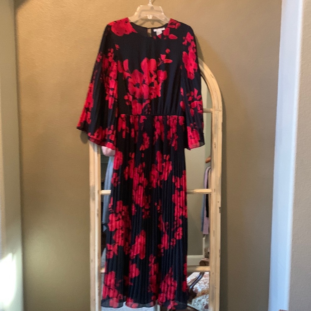 H & M black and red dress with pleated skirt and sleeves.